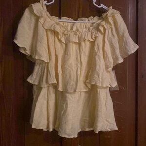 Woman’s yellow top